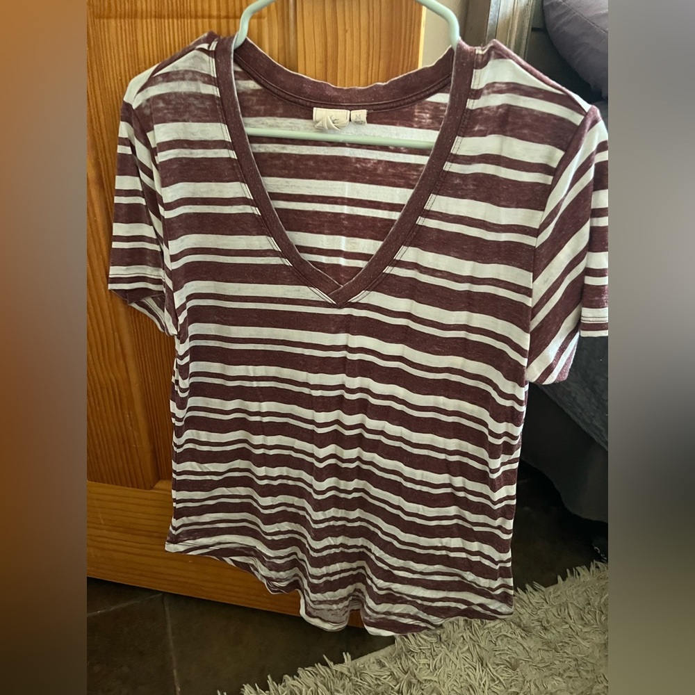 white crow maroon and white striped v neck top size small but fits bigger